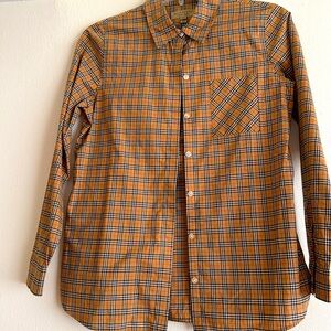 Made in Thailand. Condition is excellent,long sleeves.